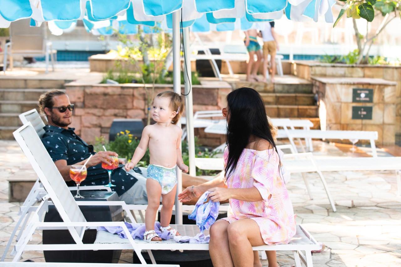 Hotel The Capital Zimbali Ballito Zewnętrze zdjęcie Family at the pool